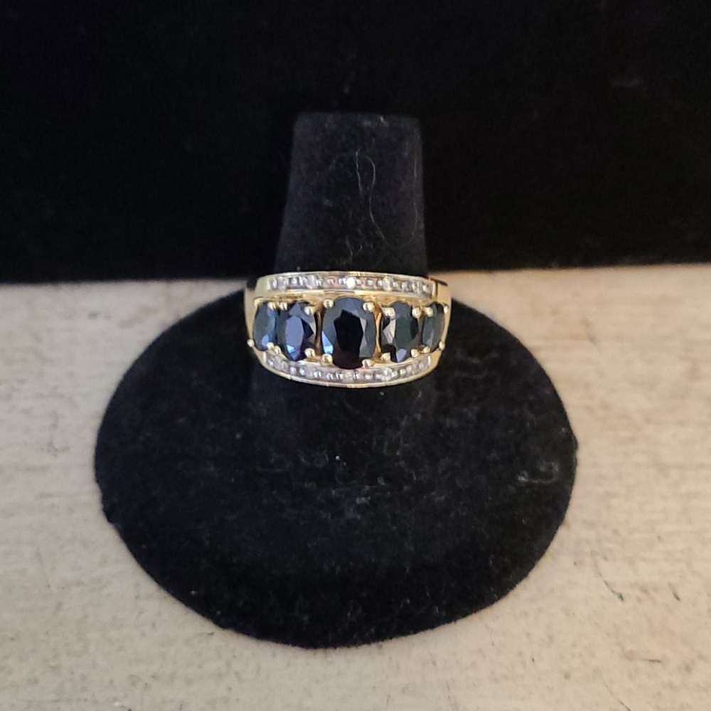 14k yellow gold with dark blue sapphires and tiny